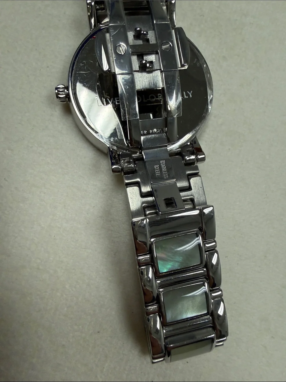 kate spade Silver and Mother of Pearl Round Bracelet Watch